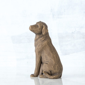 Brown wooden dog sitting figurine
