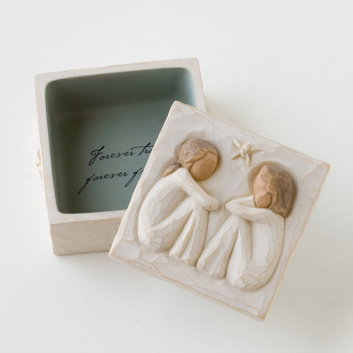 Open white keepsake box - right side is the lid with carved in two little girl figurines sitting facing each other with star in between them