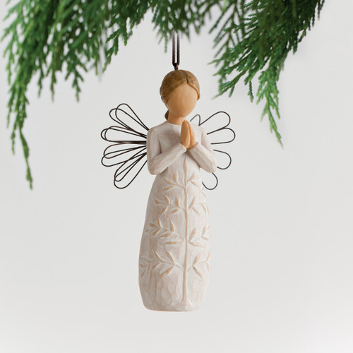 Angel faceless girl with black wire wings and white dress with tan tree print carved in her dress - praying