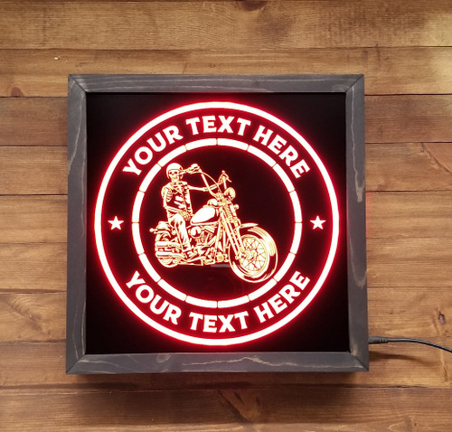 Rev up your home decor with our custom motorcycle LED sign! ?️? This 12x12 sign features a sleek black acrylic front, engraved with your choice of top and bottom lines. Plus, with the included 20 color remote, you can choose from solid or fade and flashing options to suit your mood. Perfect for any motorcycle enthusiast or garage, this sign is sure to be a conversation starter. Order yours today and add a touch of biker style to your home! ?️?️