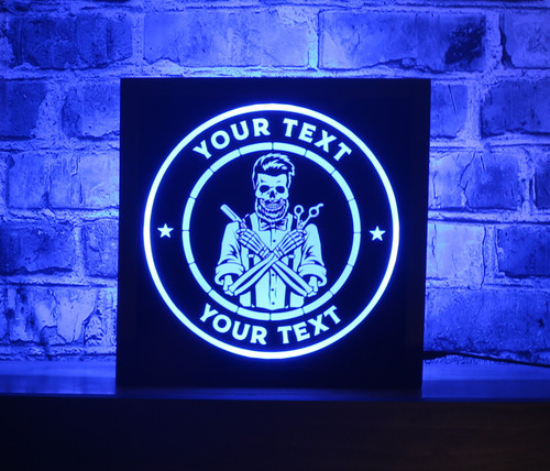 LED illuminated sign featuring a stylized barber skeleton with crossed scissors and a comb, encircled by customizable text . non neon