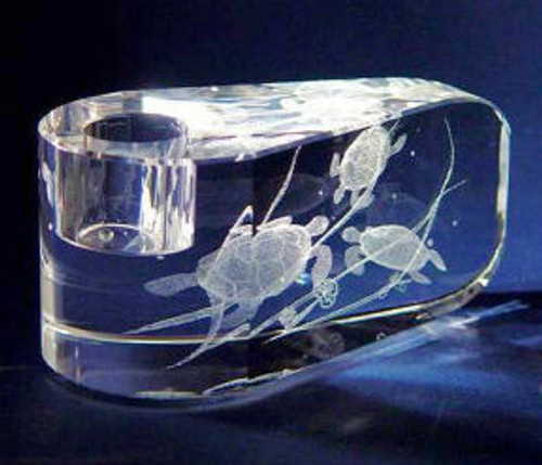 A Candleholder in glass with Turtles