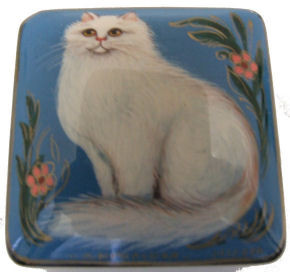 A White Cat at Attention