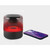 Black wireless Bluetooth speaker with glowing red light next to smartphone