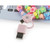 Pink USB-A to USB-C adapter with colourful flower bead bracelets, shown in packaging.