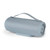 Light blue portable Bluetooth speaker with carry handle, shown at an angle.