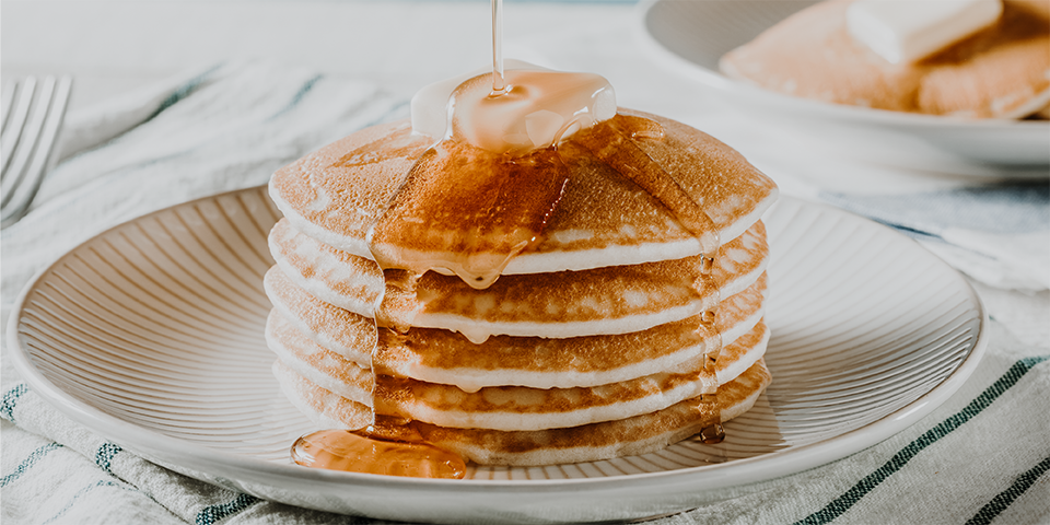 Stacked pancakes on plate