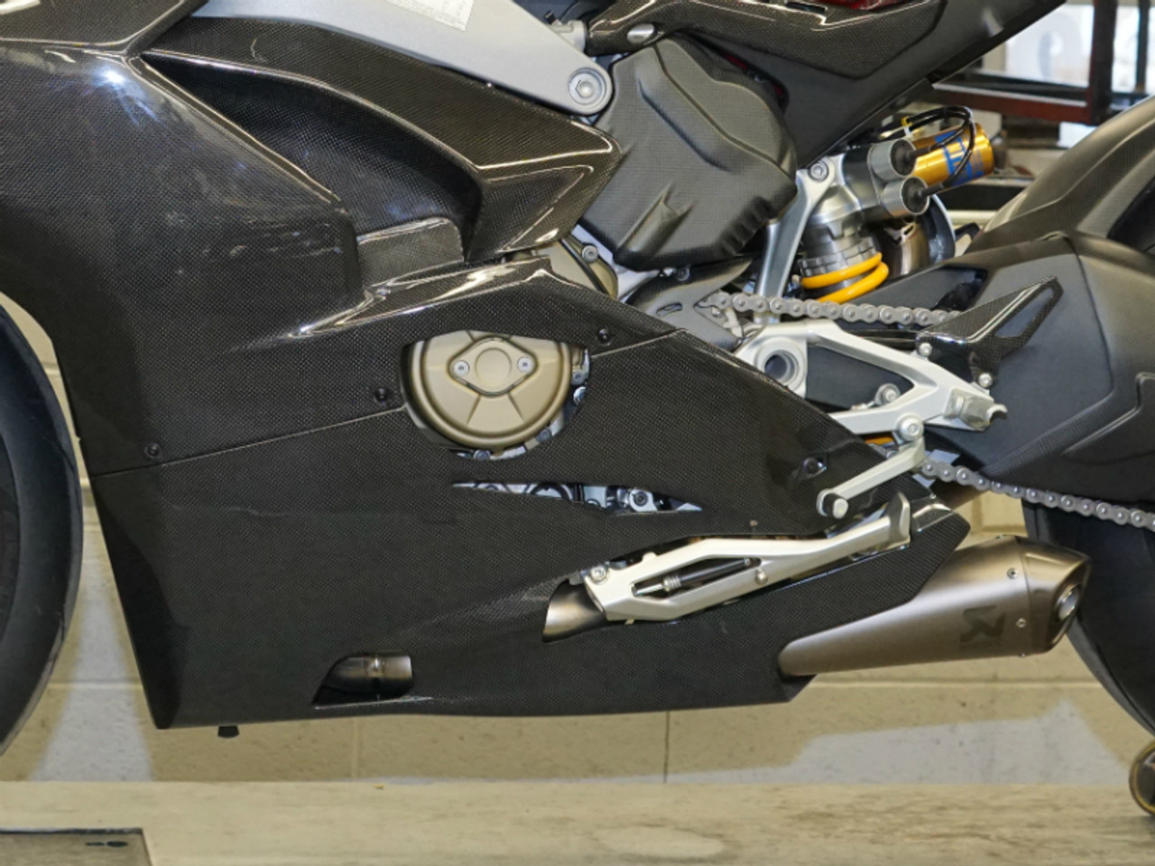 Belly Pan (left side) for Akrapovic Exhaust System in Glossy Plain Weave Carbon Fiber for Ducati Panigale V4 installed
