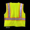 Fluorescent yellow reflective safety vest with orange and silver reflective tape designed for traffic control, construction, and nighttime visibility.
