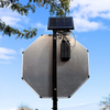 Back view of an LED-powered stop sign featuring solar charging components and mounting hardware for outdoor traffic management and all-weather safety use.