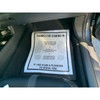 Paper floor mat with friendly customer message protects car floor