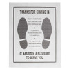 White floor mat with black print shows 2 footprints and states "Thanks for coming in" and "It has been a pleasure to serve you".