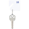 Slotted key tag hangs with key attached, numbered in upper corner