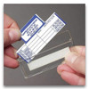 Spot Check service record card being inserted into its clear, hard-plastic holder