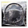 Disposable clear plastic steering wheel cover fits around steering wheel with square plastic design and back slit for easy installation.