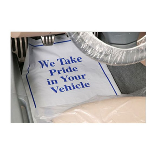 Disposable paper floor mat white with blue ink states We Take Pride in Your Vehicle