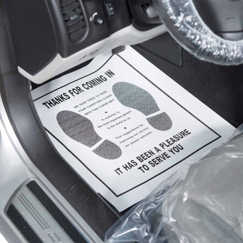 White floor mat with black print shows 2 footprints and states "Thanks for coming in" and "It has been a pleasure to serve you".