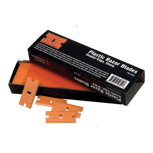 Orange double-edge plastic razor blades in black box, 100-pack