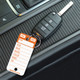 Orange TOP STRIPE Key Tag attached to car key with metal key ring.