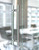 Pro-Line Series:  Ladder Pull Handle - Back-to-Back (Brushed Satin Stainless Steel  Grip US32D-630 Finish / Polished Stainless Steel Ends US32-629 Finish) mockup on glass door