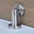 Round Face Magnetic Door Stop with hidden screw mounts (Stainless Steel Brushed Satin Finish) mockup on wood door