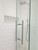 Shower Door 12" Ladder Style Back-to-Back Pull Handle,  3/4" diameter (Brushed Satin Stainless Steel Finish) on glass door