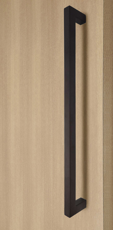 1" x 1" Square  Pull Handle - Back-to-Back (Bronze Powder Stainless Steel Finish) mockup on wood door