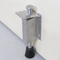 Stainless Steel Brushed Satin Finish Spring Loaded Heavy-Duty Step-On Door Holder mockup on wood door