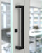 Pro-Line Series: 45º Offset 1.5" x 1" Rectangular Pull Handle - Back-to-Back, Matte Black Finish, 316 Exterior Grade Stainless Steel Alloy mockup on door