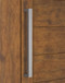 1.5" x 1" Rectangular Pull Handle - Back-to-Back (Brushed Satin Stainless Steel Finish) mockup on wood door