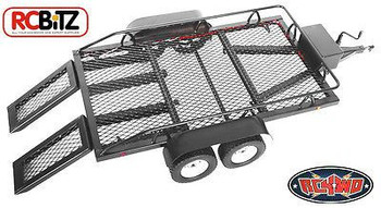 Trailer as suppled all metal with ramps and lights using a 9v battery. Working Jocky wheel.