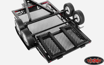 Trailer as suppled all metal with ramps and lights using a 9v battery. Working Jocky wheel.