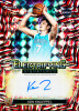 2025/26 Topps Finest Basketball Electrifying Signatures rookie autograph card featuring Kon Knueppel of the Charlotte Hornets with bold geometric refractor design.