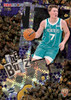 Kon Knueppel NBA Hoops “The Buzz” rookie card numbered 7/99 featuring Charlotte Hornets prospect with unique honeycomb-themed parallel design.