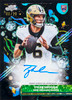 Tyler Shough 2025 Topps Cosmic Chrome Football rookie autograph card numbered 06/10 featuring the New Orleans Saints quarterback on a Black Eclipse Refractor parallel.