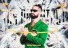 2026 Topps Universe WWE Alias insert card featuring Seth Rollins in a green suit with The Visionary design.
