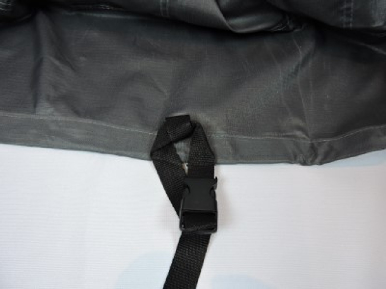 Avalon strap and buckle system for secure tie down