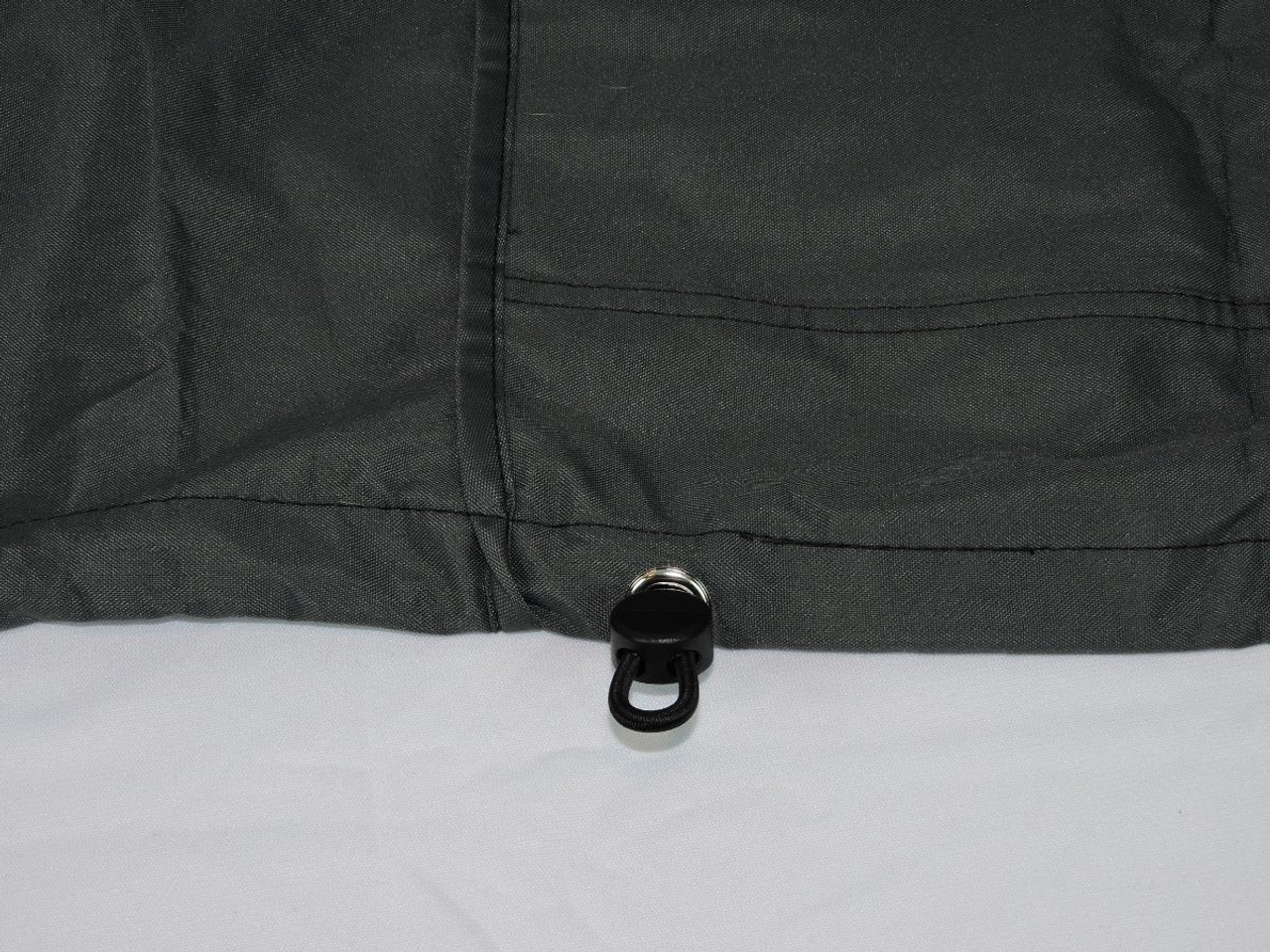 Strong adjustable hem shock cord with lock