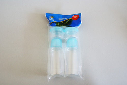 Travel Bottle Mini Pot Set (2-Pack) – A pack of two mini travel bottles with light blue caps, designed for carrying small quantities of liquids. The set is packaged in a plastic wrapper and is ideal for travel, offering a compact solution for toiletries or other liquid storage.