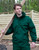 Model wearing a green men's channel jacket outdoors, highlighting the jacket's practical design, comfortable fit, and suitability for outdoor activities in various weather conditions.
