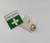 Square enamel First Aider Badge measuring 2.5cm x 2.5cm, displaying a white cross on a green background.