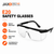 E10 safety glasses with clear lenses and black frame, designed to provide protection from debris and other hazards in industrial or outdoor environments. The glasses offer a secure fit with adjustable arms for comfort during use.