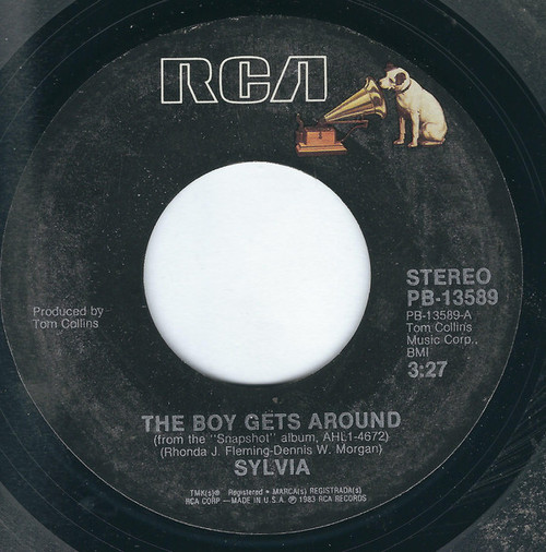 Sylvia (7) - The Boy Gets Around (7", Single, Styrene, Ind)