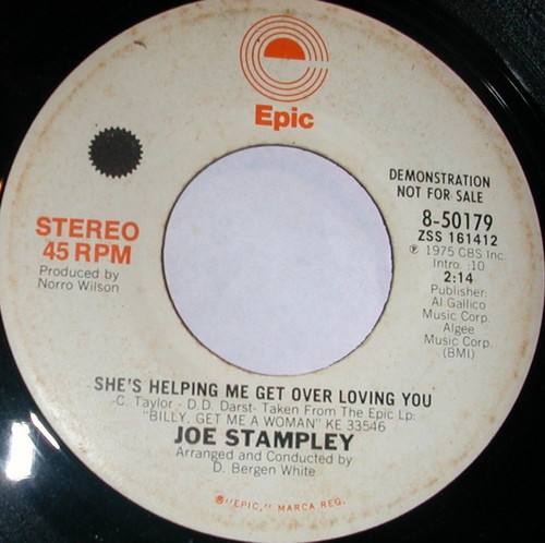 Joe Stampley - She's Helping Me Get Over Loving You (7", Promo)