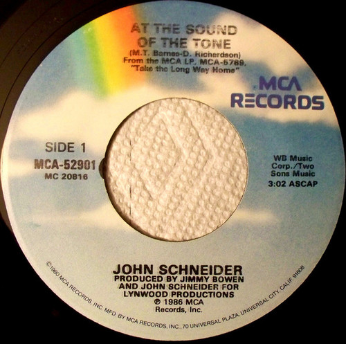 John Schneider - At The Sound Of The Tone (7", Single, Glo)