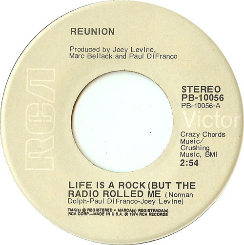 Reunion (3) - Life Is A Rock (But The Radio Rolled Me) - RCA Victor - PB-10056 - 7", Single, Ind 1099516031