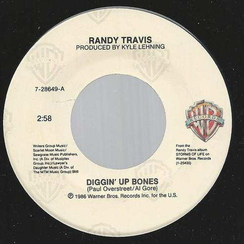 Randy Travis - Diggin' Up Bones / There'll Always Be A Honky Tonk Somewhere - Warner Bros. Records - 7-28649 - 7", Single, Spe 1101703204
