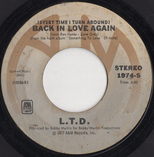 L.T.D. - (Every Time I Turn Around) Back In Love Again  - A&M Records - 1974-S - 7", Single, Styrene, Ter 1114721847