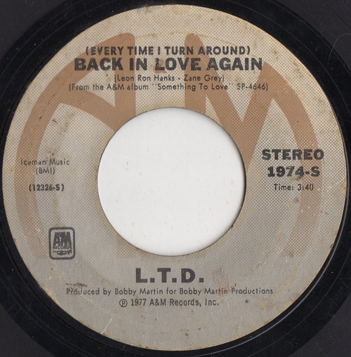 L.T.D. - (Every Time I Turn Around) Back In Love Again  - A&M Records - 1974-S - 7", Single, Styrene, Ter 1118116084