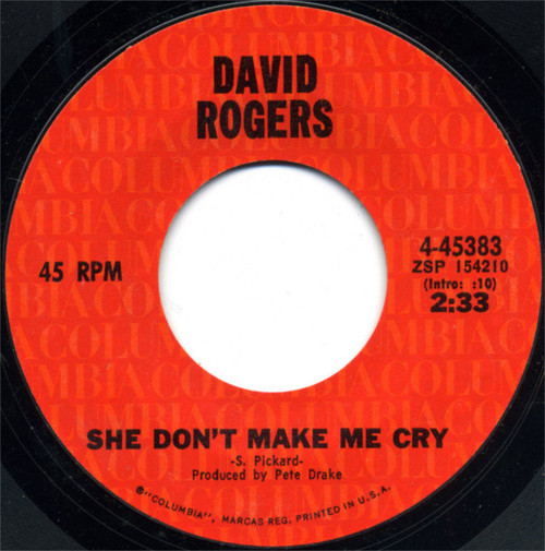 David Rogers (7) - She Don't Make Me Cry / Bottle Do Your Thing (7", Single, Styrene)